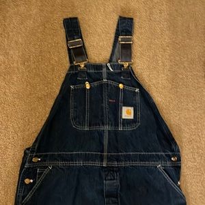 Carhartt overalls With stretchy straps.